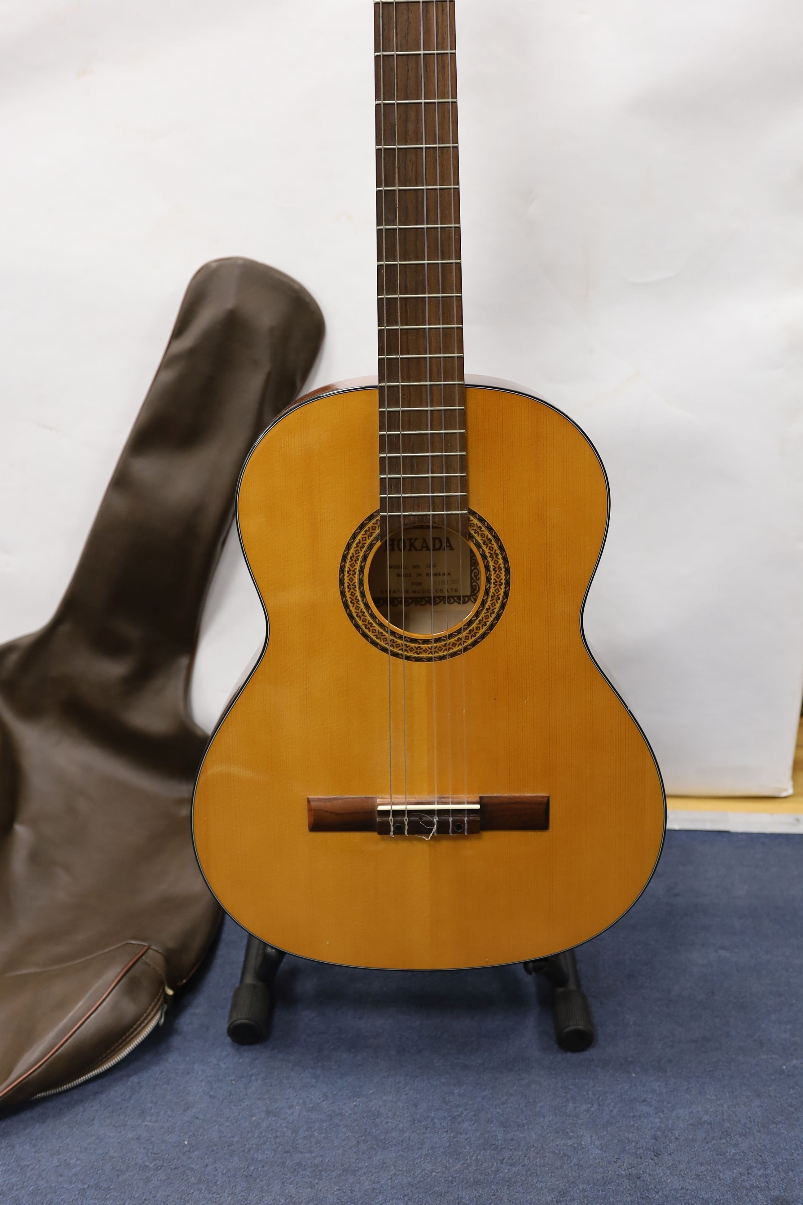 A Hokada classical guitar with case